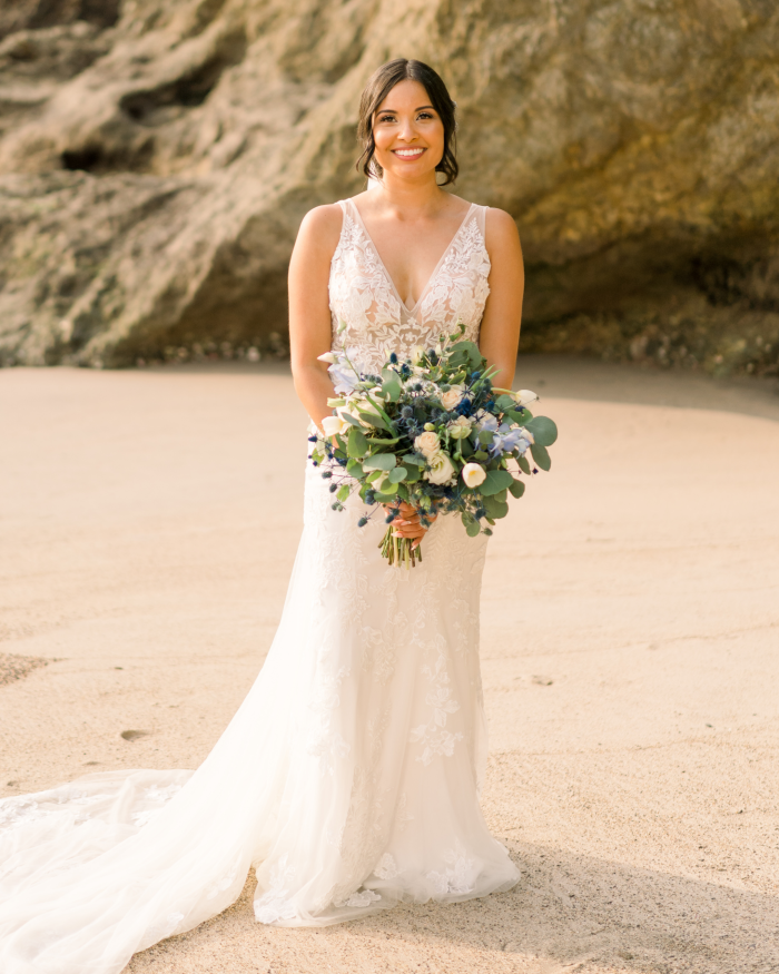 Bride Wearing V Neck Wedding Dress On Beach Called Greenley By Maggie Sottero