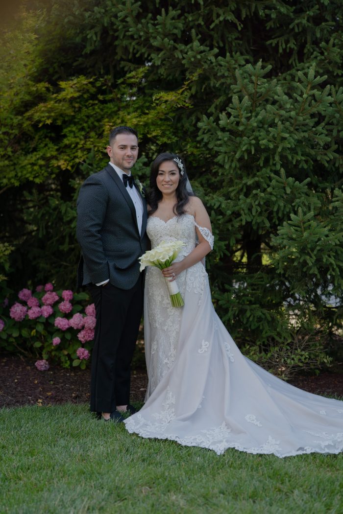Bride Wearing A Lace Fitted Wedding Dress Called Kaysen By Maggie Sottero With Groom