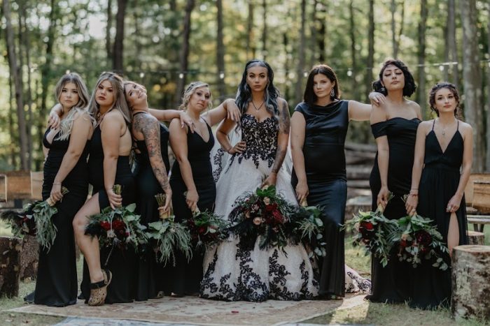 Bride In Black And White Ballgown Wedding Dress Called Tristyn By Maggie Sottero With Bridesmaids In Black