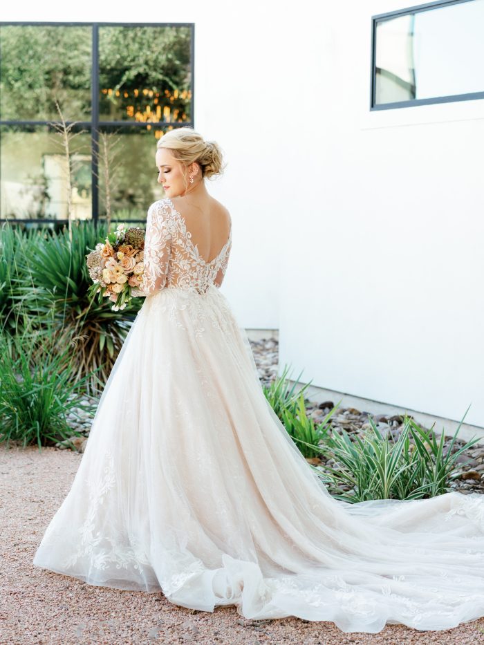 Bride In Backless A-Line Wedding Dress Called Zander By Sottero And Midgley