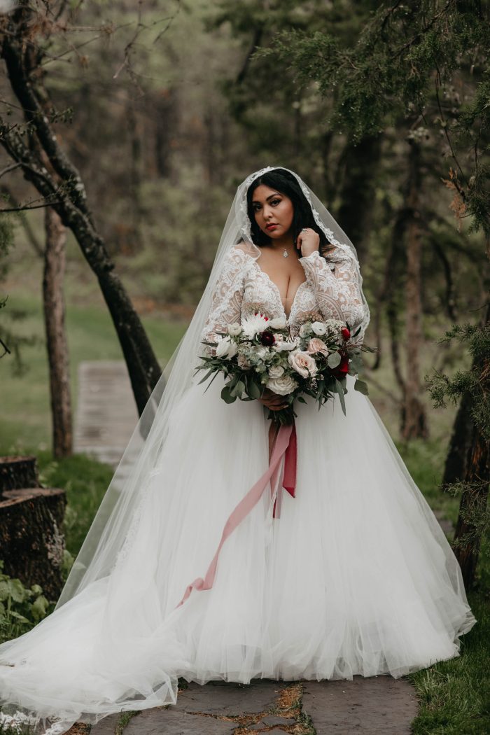 Latino Bride Wearing A Long Sleeve Wedding Dress Called Mallory Dawn By Maggie Sottero