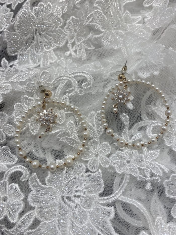 Photo Of Wedding Pearls With Pearl Earrings On Lace