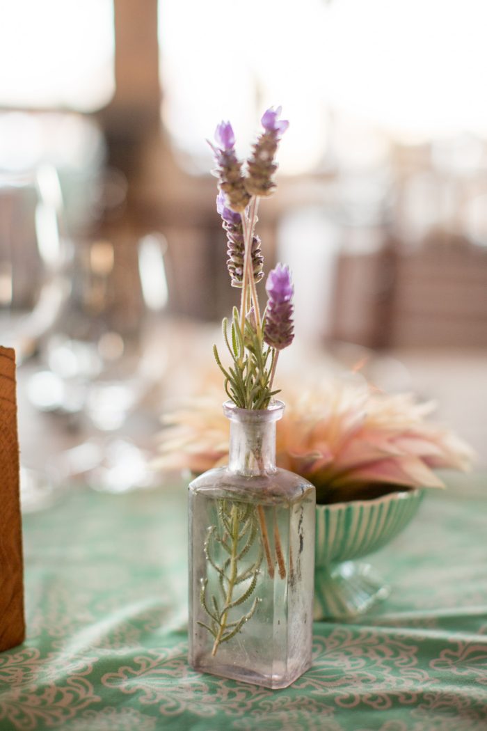 Photo Of Thrifted Vase With Hand Picked Flower In It As A Sustainable Wedding Idea