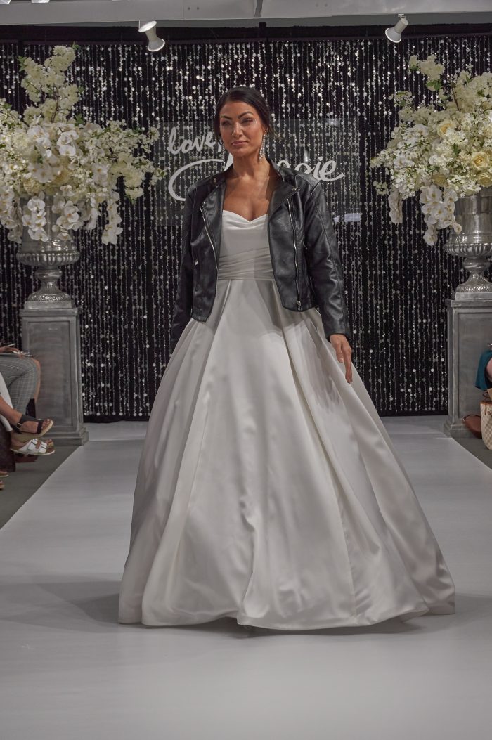 Model In White Ballgown Wedding Dress Called Anniston By Maggie Sottero With Leather Jacket