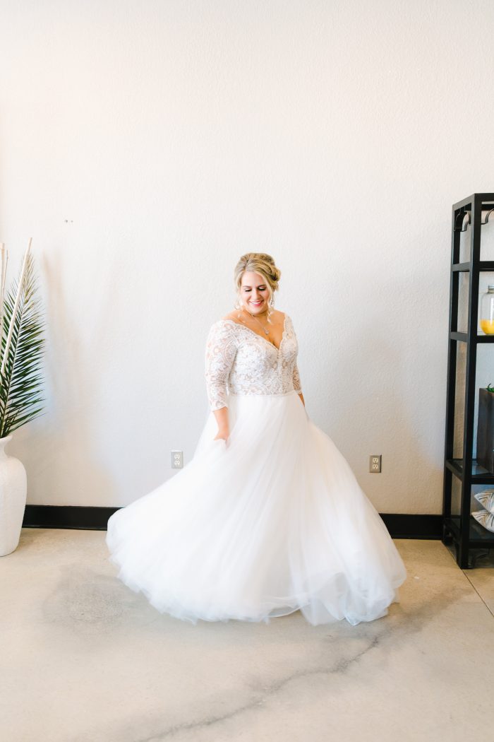 Bride Wearing Lace Ballgown Called Mallory Dawn By Maggie Sottero
