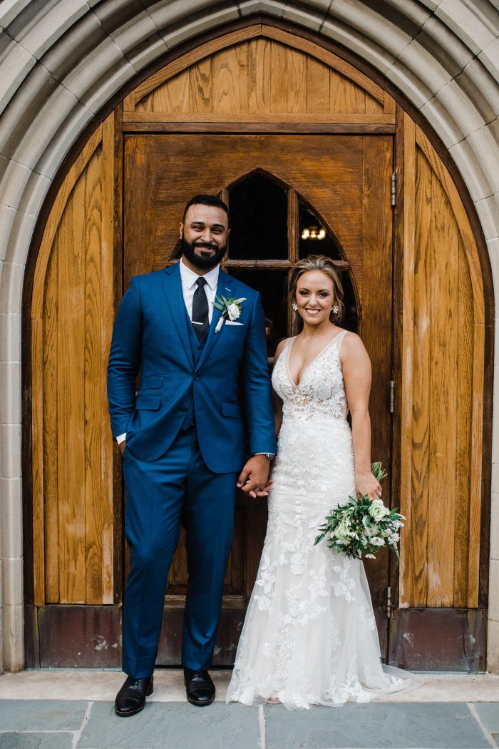 Bride Wearing Sexy Lace Wedding Dress Called Greenley By Maggie Sottero With Groom In Front Of Church
