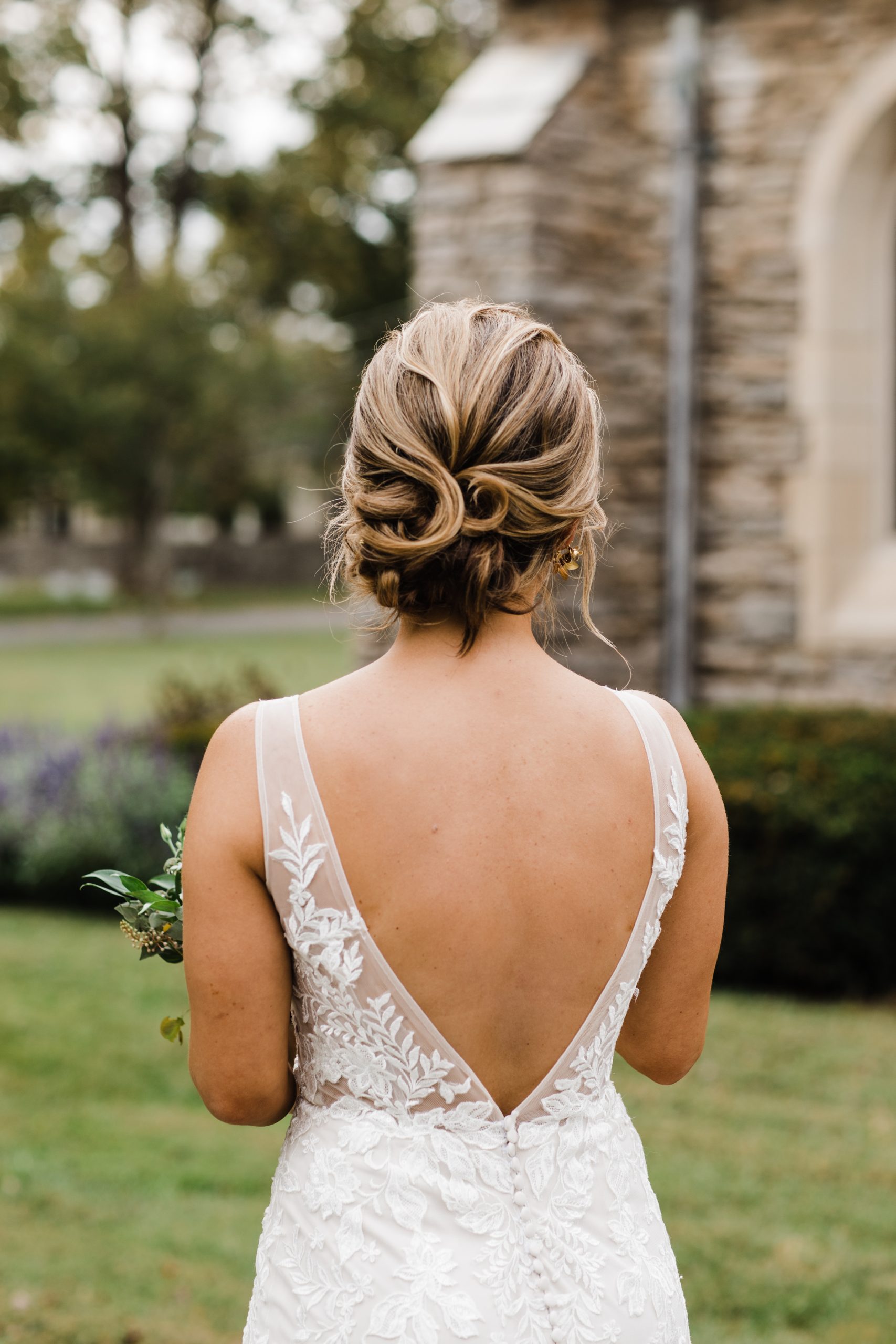 Bride Wearing Lace Backless Dress Called Greenley By Maggie Sottero With Soft Updo