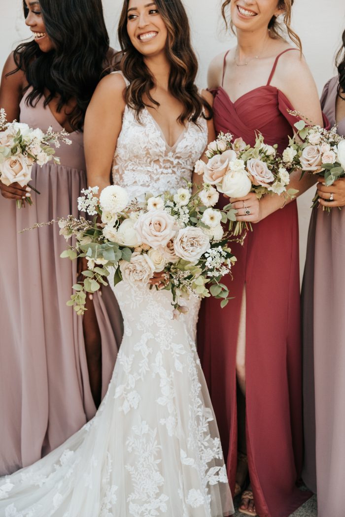 Bride Wearing Wedding Dress Called Greenley With Bridesmaids In Maroon And Blush