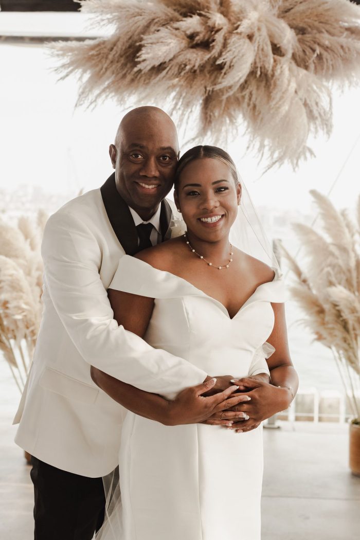 Bride Wearing Josie By Rebecca Ingram Standing With Groom