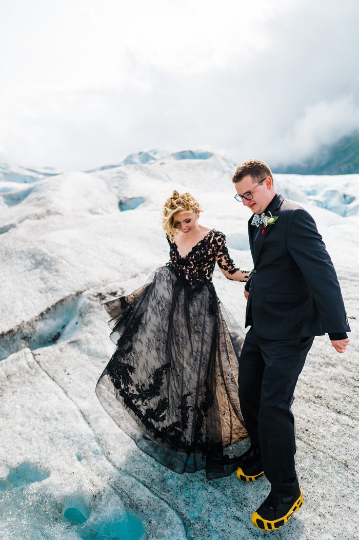 Bride Wearing Long Sleeve Black Wedding Dress Called Zander By Sottero And Midgley With Groom In Glaciers