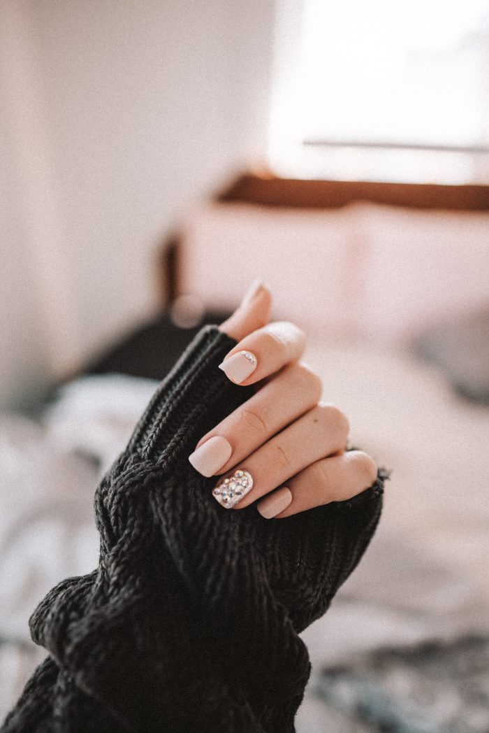 Woman With Girly Pink And Silver Nails