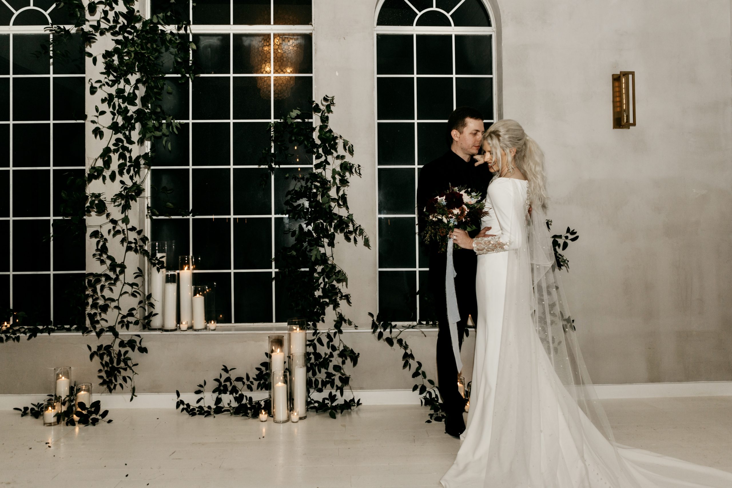 Bride Wearing Simple Wedding Dress With Pearls Called Aston By Sottero And Midgley With Groom In Greenhouse Wedding Venue