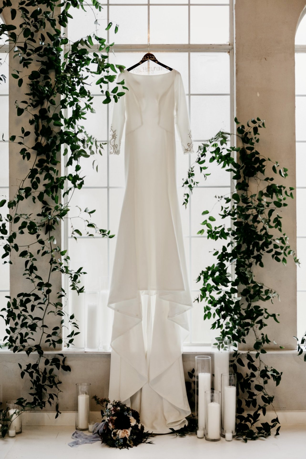 Bride Wearing Unique Simple Wedding Dress With Pearl Pins Called Aston By Sottero And Midgley