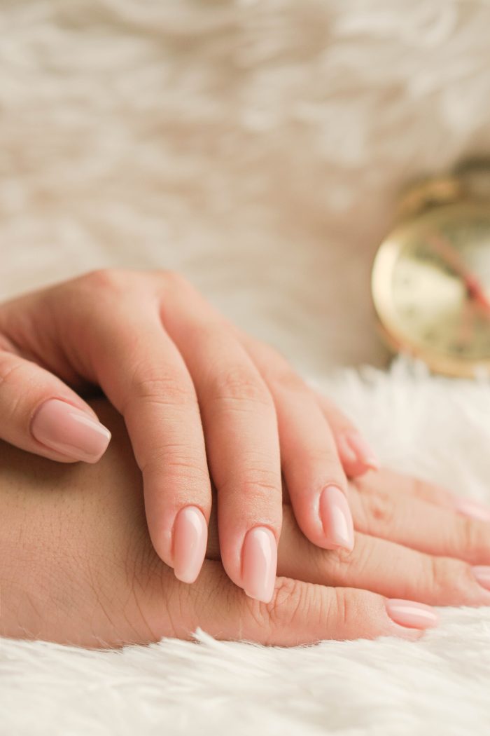 Woman With Classic Natural Manicure