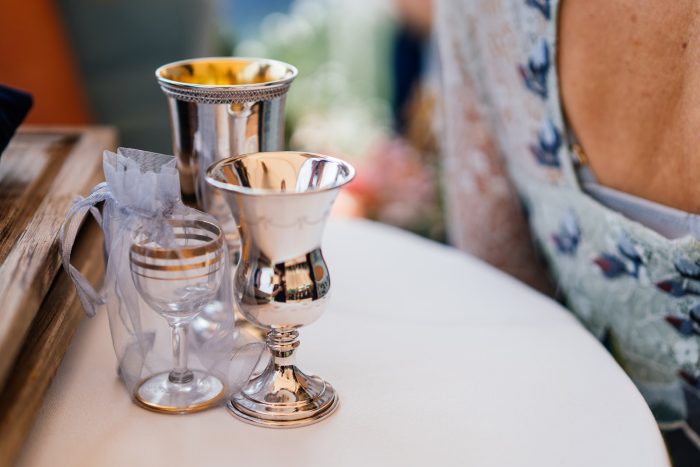 Photos Of Wine Glasses During A Jewish Wedding