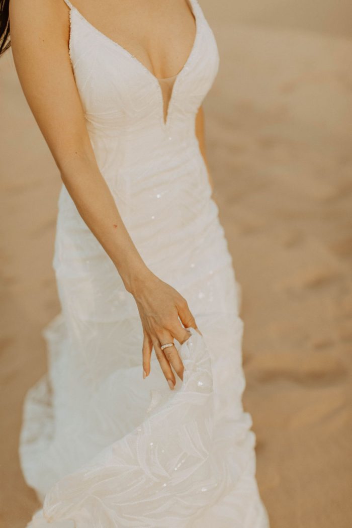 Asian Bride Wearing A Beaded Wedding Dress Called Elsie by Rebecca Ingram In Desert Wedding