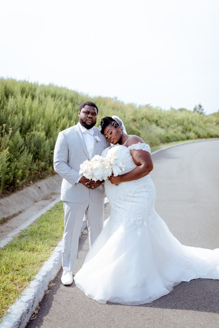 Black Bride Bride Wearing A Fit And Flare Wedding Dress Called Alistaire Lynette By Maggie Sottero With Groom