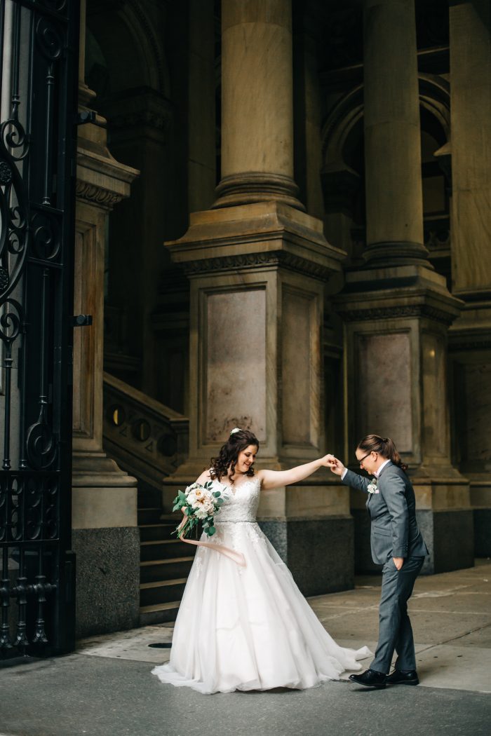 LGBTQ+ Bride With Wife Wearing An A-Line Wedding Dress Called Olivia By Rebecca Ingram