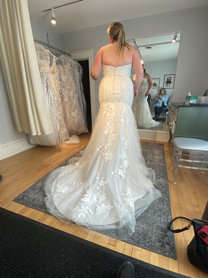 Bride During Bridal Appointment Trying On A Mermaid Wedding Dress Called Hattie By Rebecca Ingram