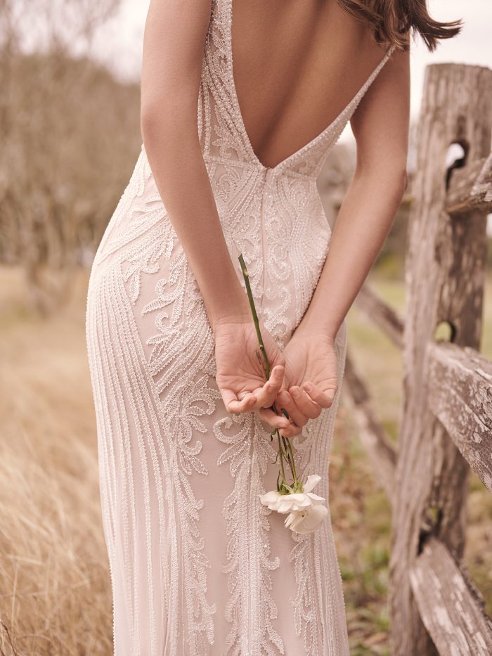 Bride Wearing Sheath Wedding Dress With Vintage Lace And Beading Called Ambreal By Maggie Sottero