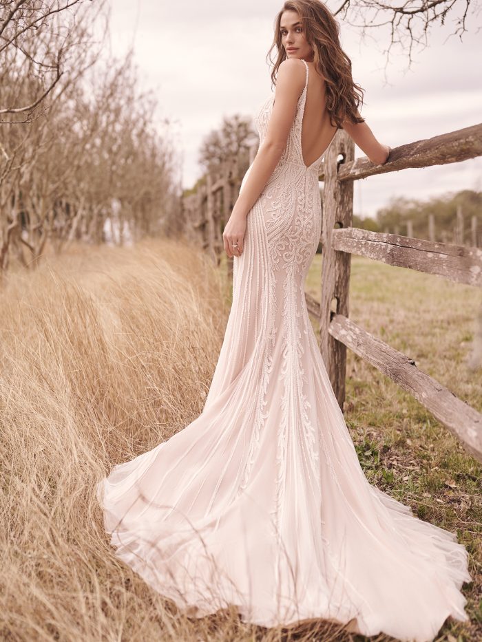 Bride Wearing Trendy Wedding Dress Called Ambreal By Maggie Sottero In Field