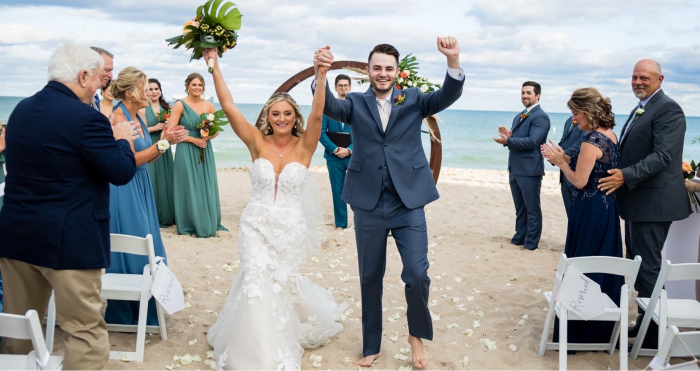 Bride Wearing Wedding Dresses Miami In A Gown Called Hattie By Rebecca Ingram On Beach