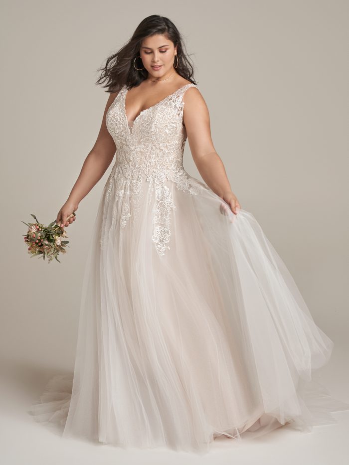 Bride Wearing Plus Size Wedding Dress Called Emily Lynette By Rebecca Ingram