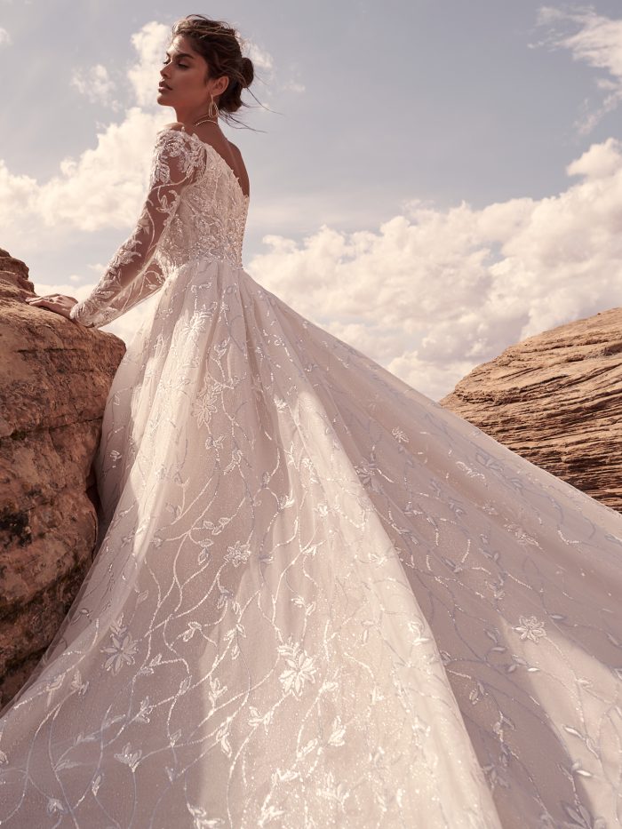 Bride Wearing Sparkly Off The Shoulder Wedding Dress With Long Sleeves Called Seneca By Sottero And Midgley