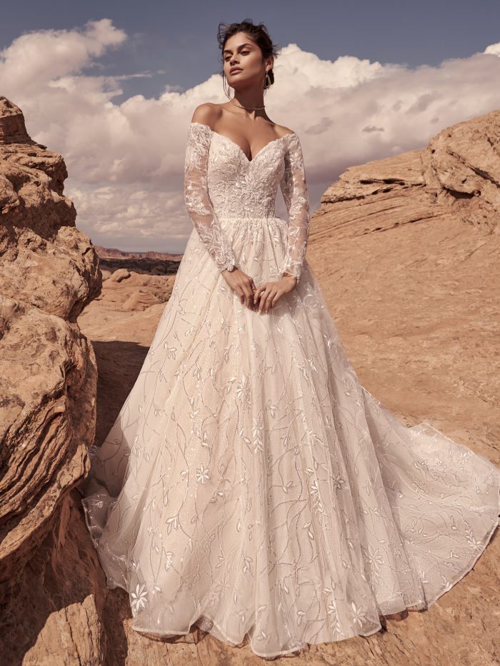Bride Wearing Sparkly Off The Shoulder Wedding Dress With Long Sleeves Called Seneca By Sottero And Midgley