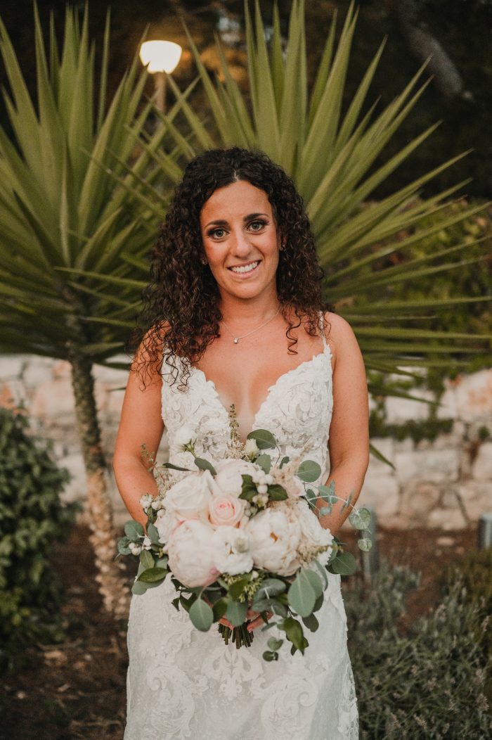 Bride In Tropical Wedding Wearing A Sexy Wedding Dress Called Tuscany Lane By Maggie Sottero
