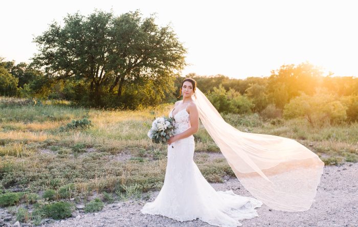Bride Wearing Lace Sheath Wedding Gown Called Tuscany Royale By Maggie Sottero With Veil