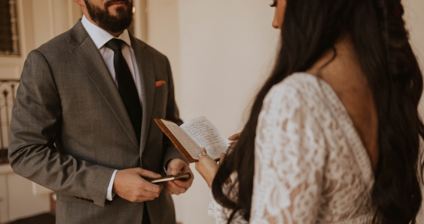 Bride Reading Vows to Husband