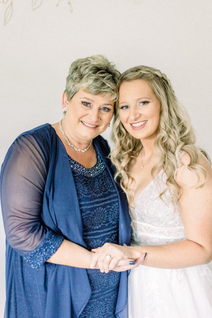 Bride With Woman On Her Wedding Day Wearing A Wedding Gown Called Raelynn By Rebecca Ingram