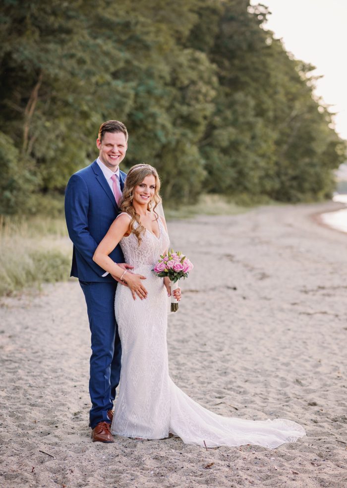 Bride Wearing A Beaded Sexy Beach Wedding Dress Called Elaine By Maggie Sottero With Groom On Beach