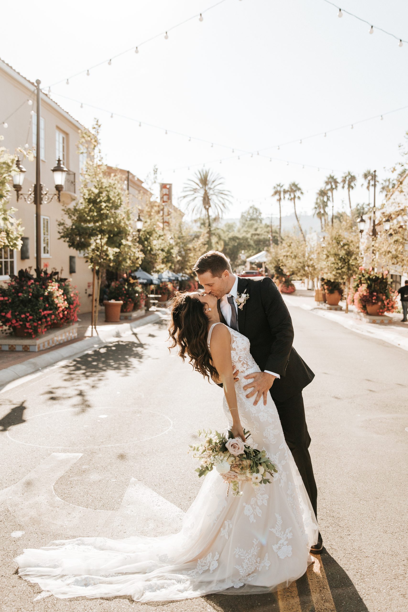 Bride Wearing A Sexy Wedding Dress Called Greenley By Maggie Sottero With Groom In Tropical Wedding