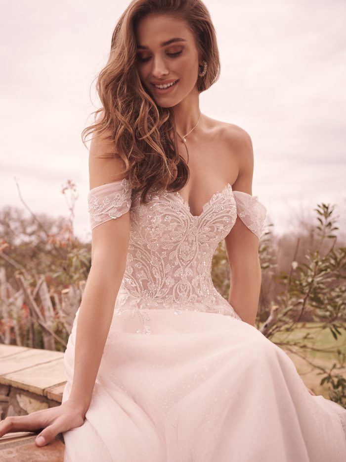 Bride In Glamorous Wedding Dress With Detachable Bridal Sleeves Called Artemis By Maggie Sottero