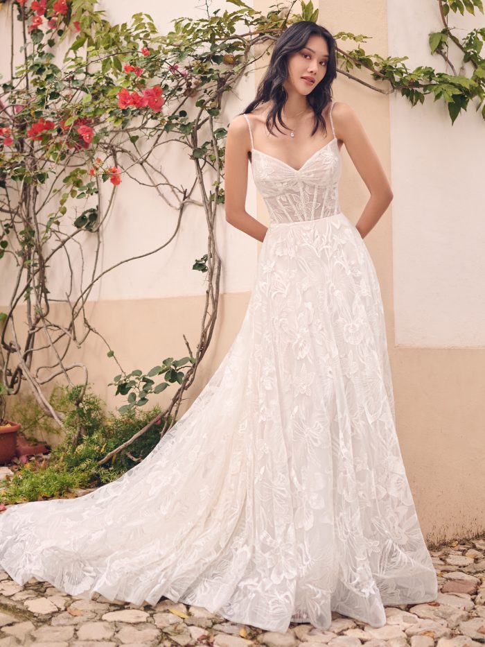 Bride wearing Havana western wedding dress by Maggie Sottero