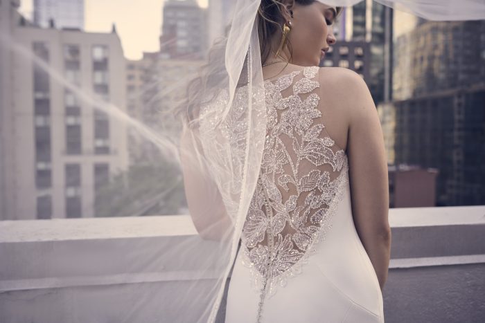 Bride In Beaded Crepe Wedding Dress Called Noah By Maggie Sottero