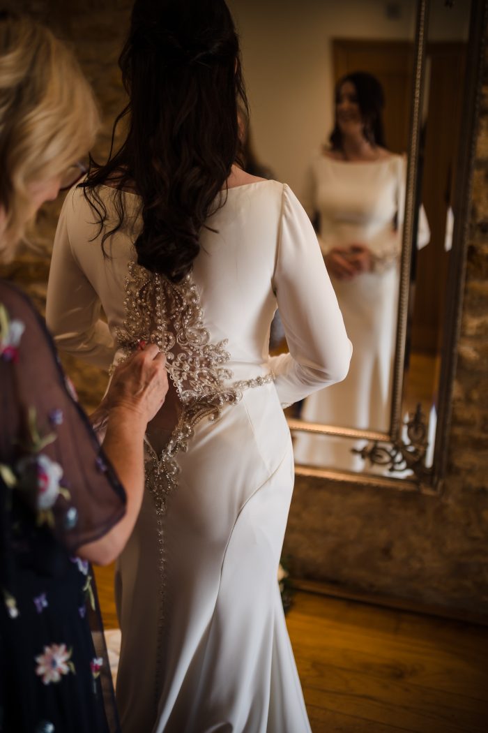 Bride In Crepe Long Sleeved Wedding Dress Called Aston By Sottero And Midgley