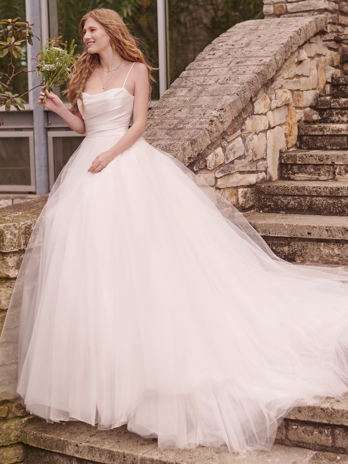 https://www.maggiesottero.com/blog/disney-princess-wedding-dresses/Bride In Ballgown Wedding Dress Called Vivien By Rebecca Ingram