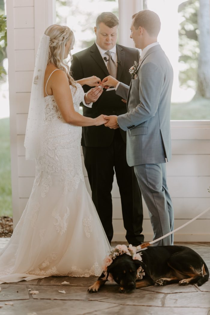 Bride In Lace Wedding Dress Called Fiona With Dog At Alter With Her And Husband