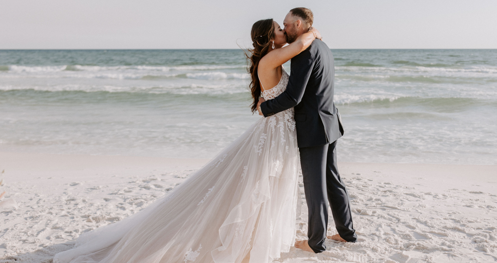 Bride On Beach In Ballgown Wedding Dresses Called Lettie By Rebecca Ingram