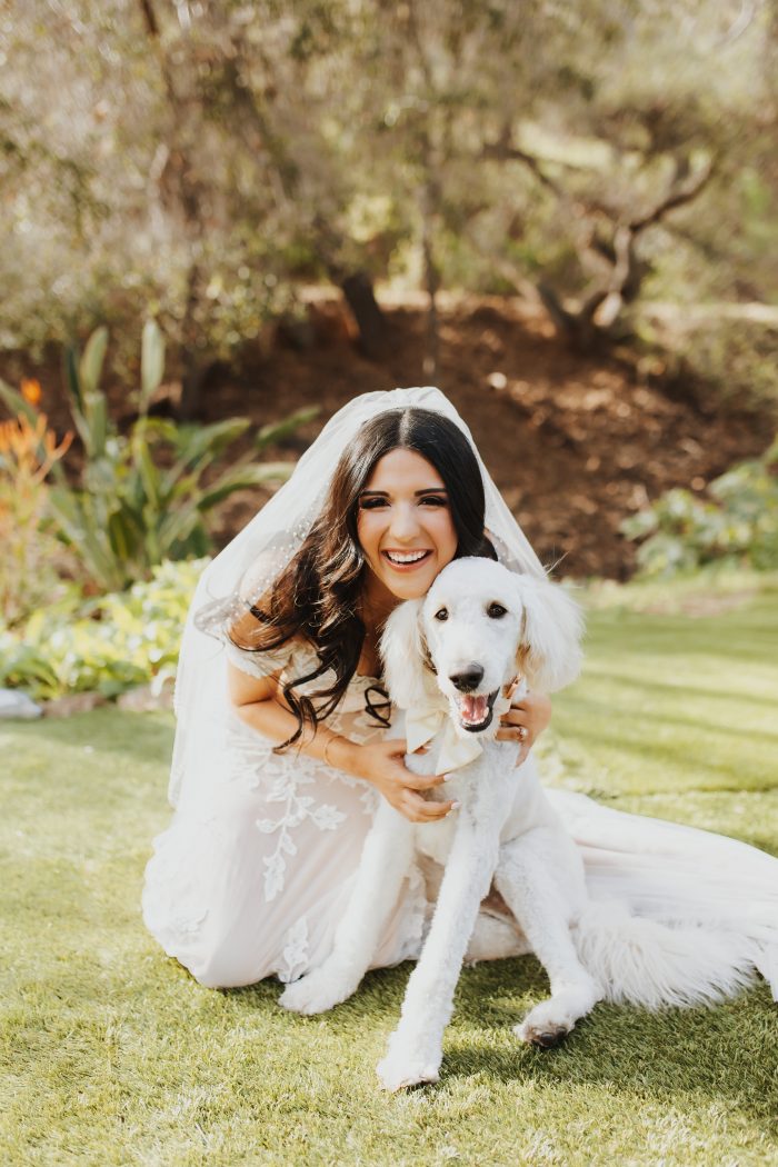 Bride With Dog Wedding Guest Wearing Wedding Dress Called Ivy By Maggie Sottero