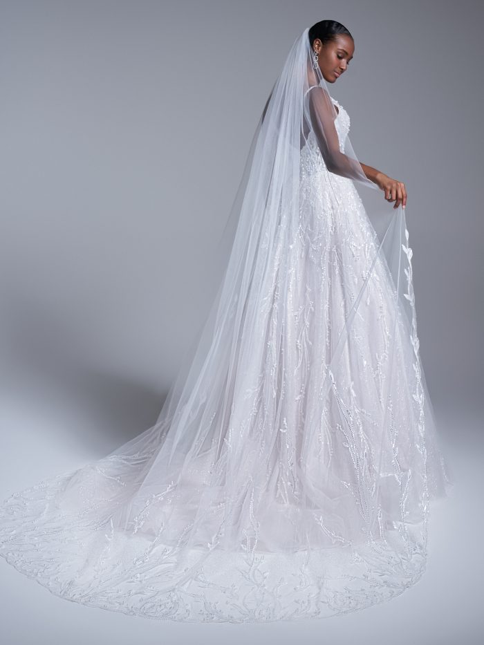 Bride In Beaded Ballgown Wedding Dress Called Marvine By Sottero And Midgley With Chapel Length Veil