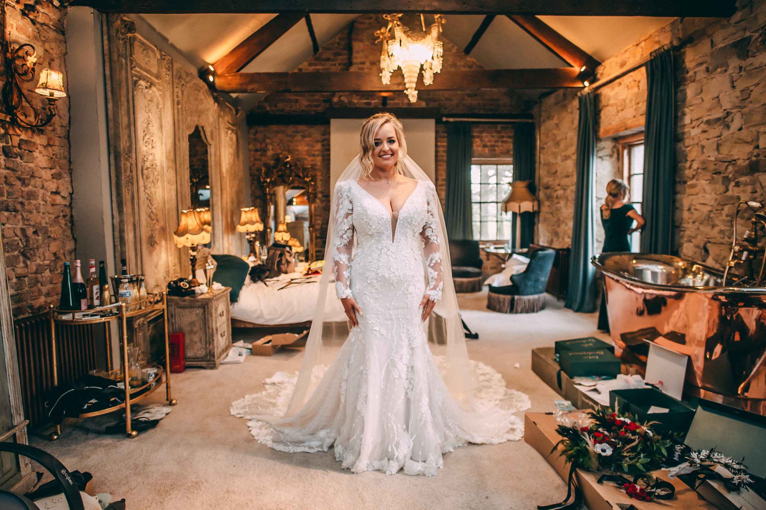 Bride In Long Sleeve Lace Wedding Dress Called Cruz By Sottero And Midgley