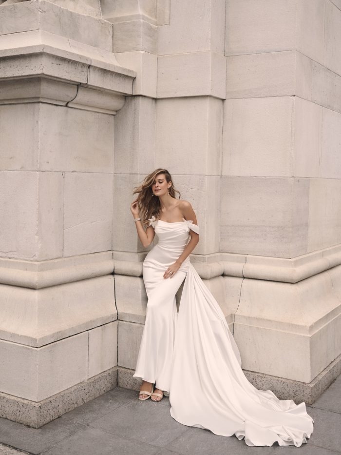 Bride In Satin Off-The-Shoulder Wedding Dress Called Cameron By Maggie Sottero
