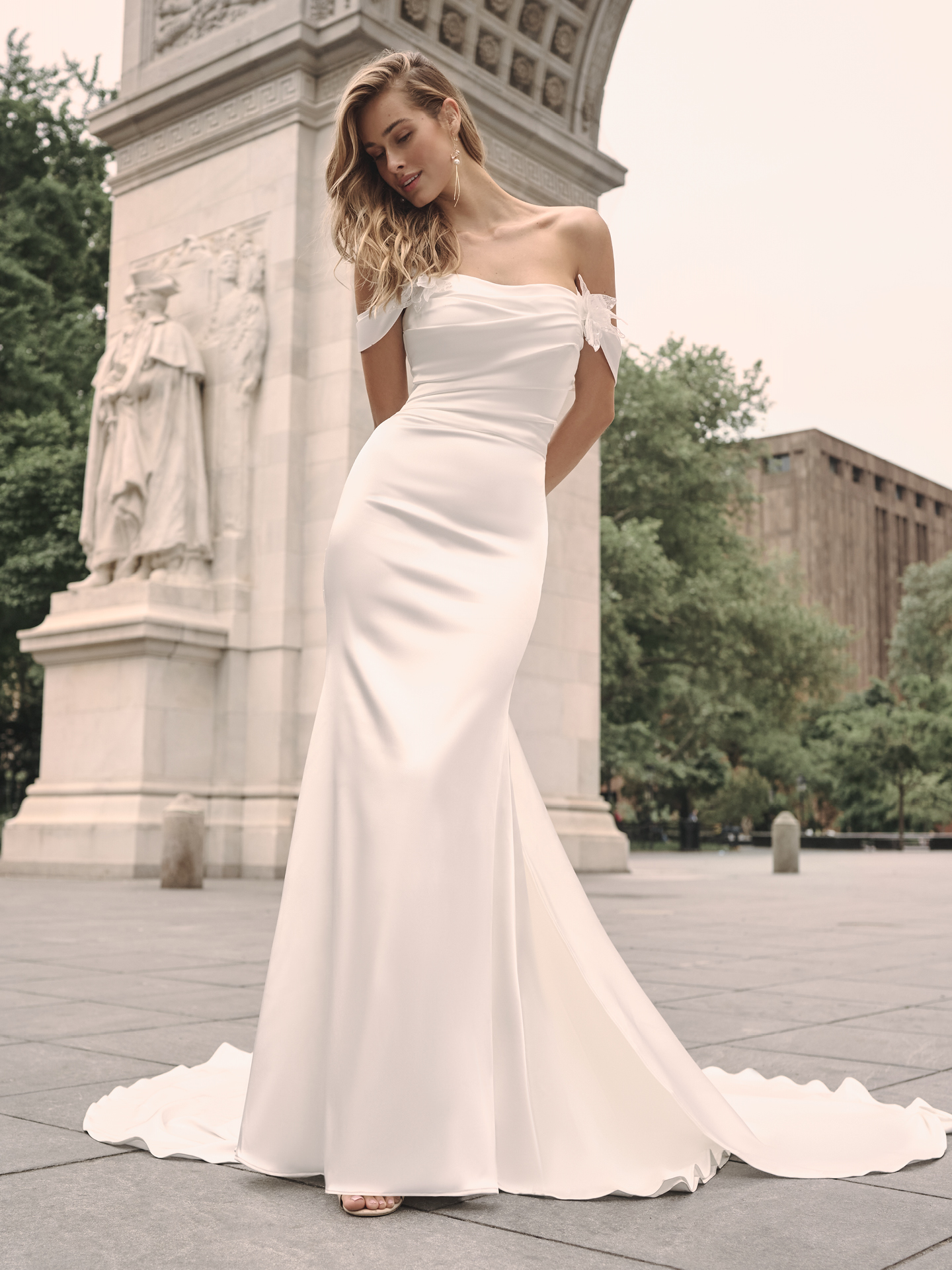 Bride In Satin Off-The-Shoulder Wedding Dress Called Cameron By Maggie Sottero
