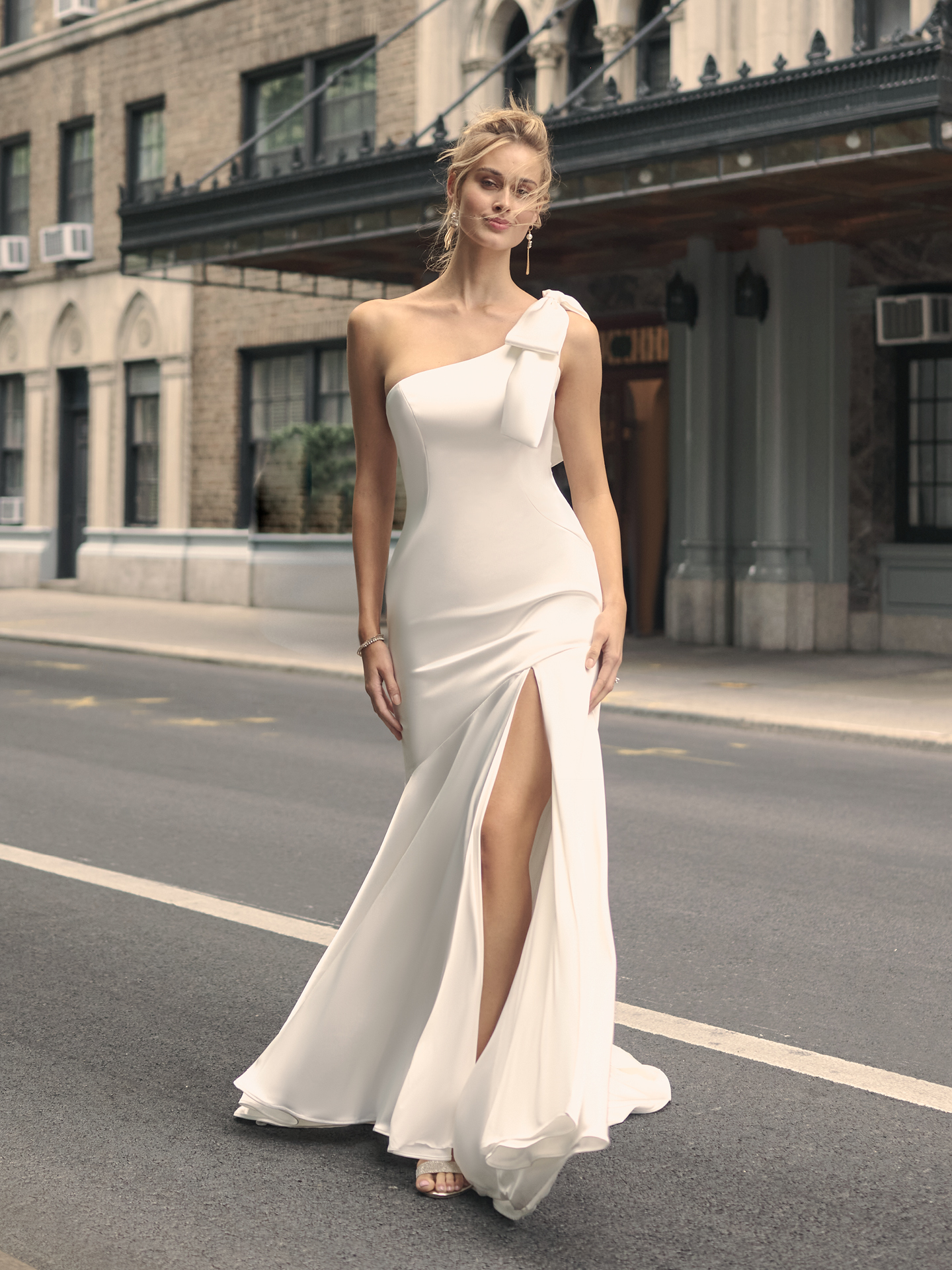 Bride In Asymmetrical Wedding Dress Called Saratoga By Maggie Sottero