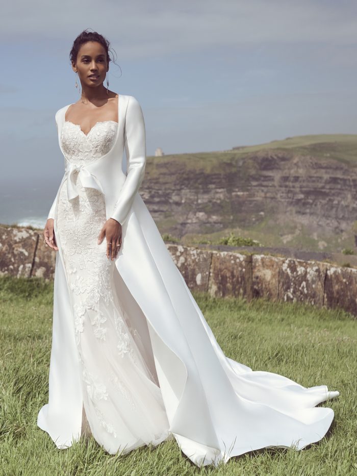 Bride In Long Sleeve Wedding Jacket Called Kent By Maggie Sottero And Wedding Dress Called Helen By Rebecca Ingram