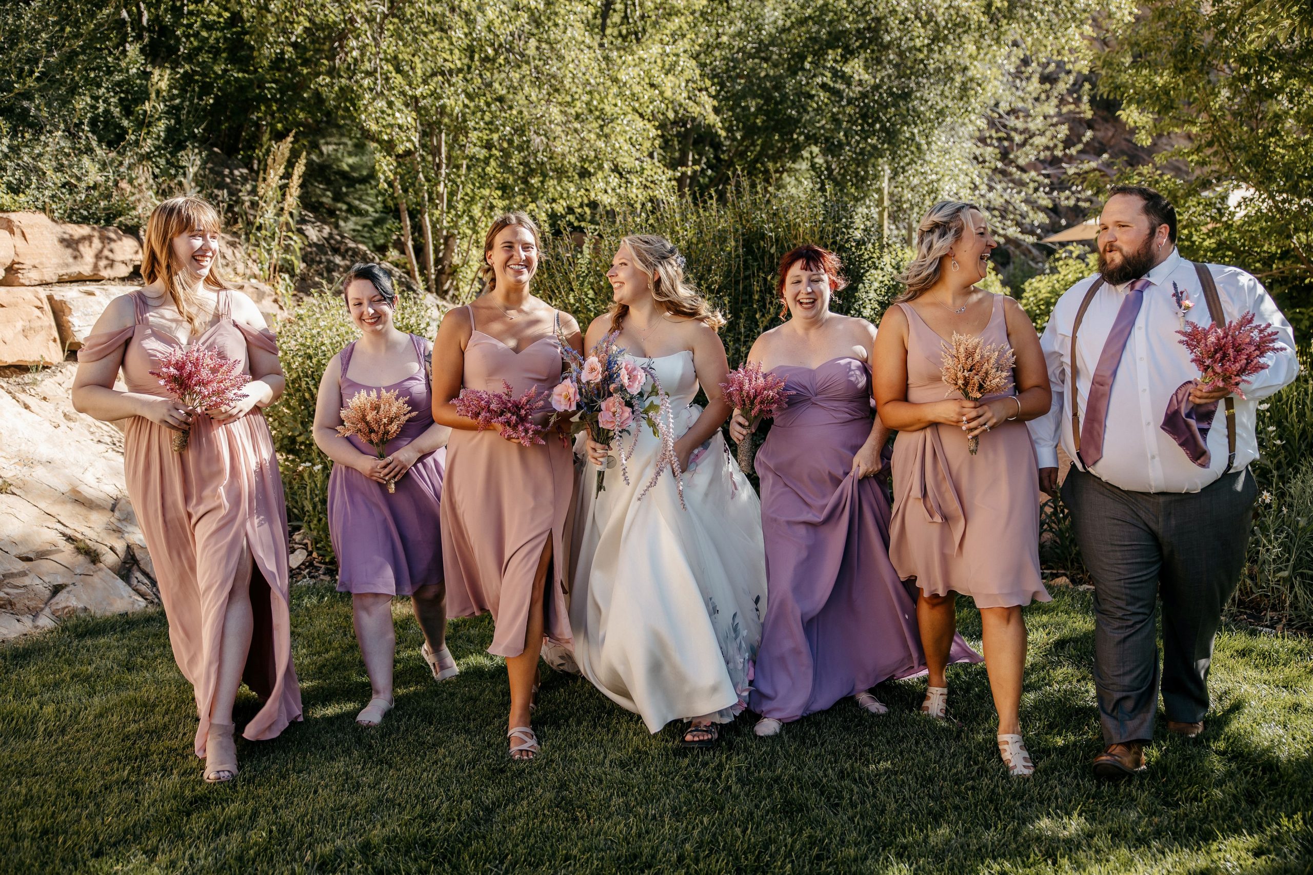 Bride In Simple Wedding Dress Called Selena By Maggie Sottero With Bridesmaids In Pinks And Purples
